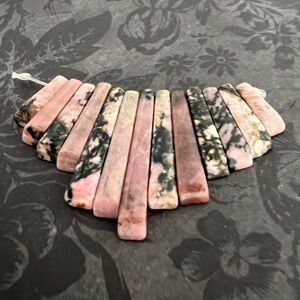Rhodonite graduated fan cluster set of 13